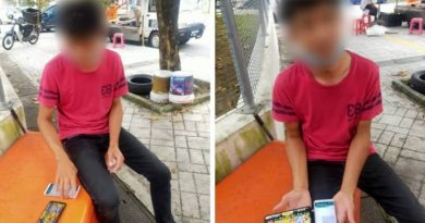 在路边非法网赌 男子被警逮捕