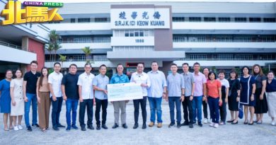 沈志强拨14万助侨光 裝置大荧幕 翻新柏油路