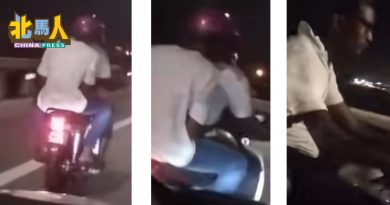 大桥骑士未戴头盔 放车篮 拍摄者被呛 驾好你自己的车！