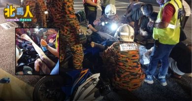 华裔骑士失控翻覆 小腿遭车尾铁架刺穿