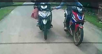 摩哆贼尾随女子 住宅区突下手夺包